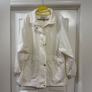 Vintage London Fog rain jacket, white , has an elastic tie at the bottom